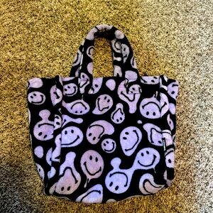 Fuzzy smiley tote